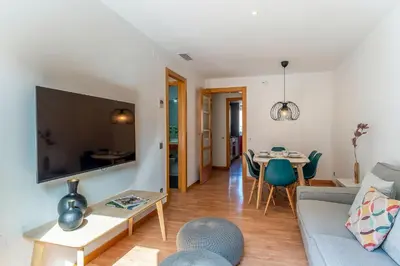 a living room with a couch and a table at 1520 - AB Eixample Sicília Apartment in Barcelona