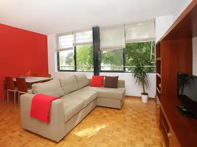 a living room with a couch and a tv at Apartment Vila Olimpica Pamplona by Interhome in Barcelona