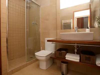 a bathroom with a toilet and a sink and a shower at Apartment Vila Olimpica Pamplona by Interhome in Barcelona