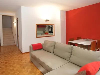 a living room with a couch and a table at Apartment Vila Olimpica Pamplona by Interhome in Barcelona