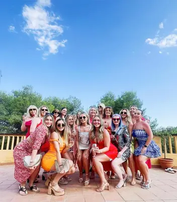 a group of women are posing for a picture at Villa Golf Sitges in Vilanova i la Geltrú