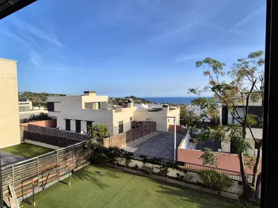 an aerial view of a house with a yard at Casa Elena Maresme in Mataró