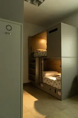 a room with two bunk beds in a room at Leevin Student Barcelona in Barcelona