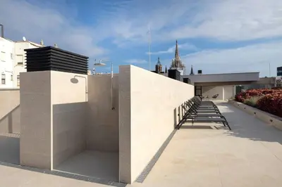 a building with a staircase on the side of it at Luxury apartment in Barcelona City Center in Barcelona