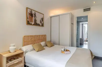 a bedroom with a white bed and a picture on the wall at 1802 - AB Poblenou Comfort in Barcelona