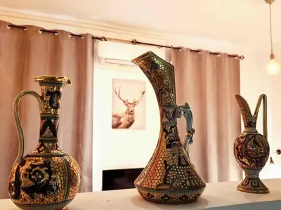 two vases sitting on top of a table at Loft nearby Sagrada Familia in Barcelona