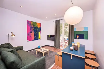 a living room with a couch and a table at Sweett - Casa Miro in Barcelona