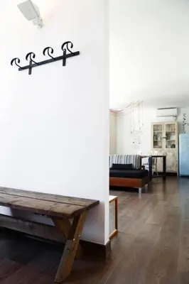 a living room with a table and a couch at Apartment Vila Olímpica Barcelona next to beach & garden in Barcelona