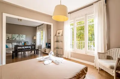 a hallway with a door leading to a bedroom at The Collection Barcelona - Sants Estacio - Modern and comfy 4BD for 8 guests in Barcelona