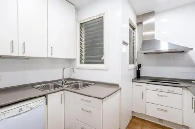 a bedroom with a large bed and a window at The Collection Barcelona - Sants Estacio - Modern and comfy 4BD for 8 guests in Barcelona