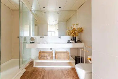 a bathroom with a shower and a toilet and a mirror at APARTMENT JUST 100mts FROM GAUDI'S CASA MILÀ-la Pedrera in Barcelona