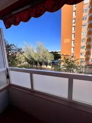 a window with a view of a building at Ca La Lidia in Viladecáns
