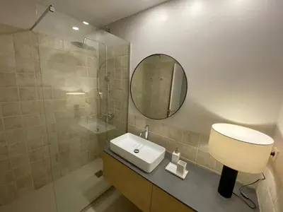 a bathroom with a sink and a mirror at Sitges Spaces Garden Oasis 3 Bedroom 2 Bath Garden in Sitges