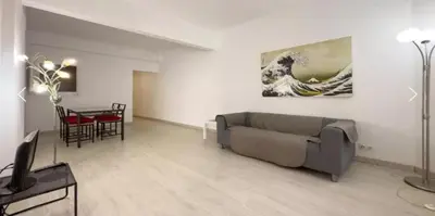 a living room with a couch and a table at Precioso Estudio en Sant Gervasio in Barcelona