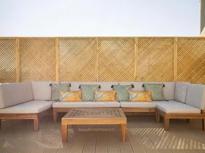 a living room with a couch and two tables at Sunny Apartment 3bed with terraze in Barcelona