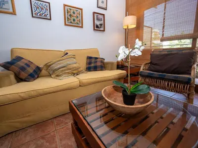 a living room with a couch and a coffee table at Apartment Zodiak by Interhome in Pineda de Mar