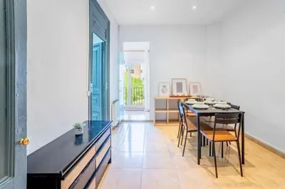 a bedroom with a bed and a mirror at The Collection Barcelona - Private terrace Attico 3BD in Gran de Gracia in Barcelona