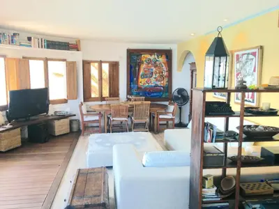 a living room with a couch and a table at Tot Gaviota in Sitges
