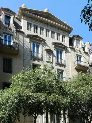 a large building with trees in front of it at Casa Mathilda in Barcelona