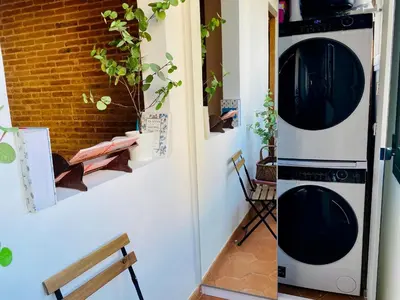 a bedroom with a bed with two lights on it at Piso en Poblenou, Playa a 5 min in Barcelona