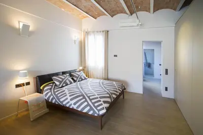 a bedroom with a zebra print bed in a room at Barcelona InLoft in Barcelona