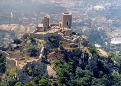 an old castle on top of a mountain at Apartamento Cabrera Burriac in Cabrera de Mar
