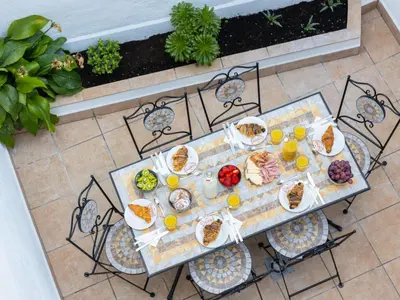 an aerial view of a table with plates of food at Matarolux24 in Mataró