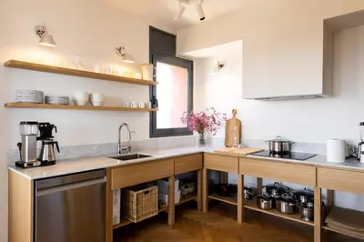 a kitchen with a sink and a counter at Circles House Coliving & Coworking in Barcelona
