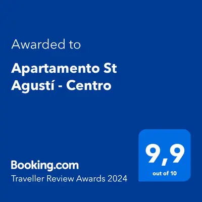 a blue sign with the text awarded to apartment st austric centre at Apartamento St Agustí - Centro in Mataró