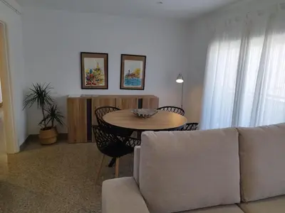 a living room with a couch and a table at Apartament IXA-2 in Manresa
