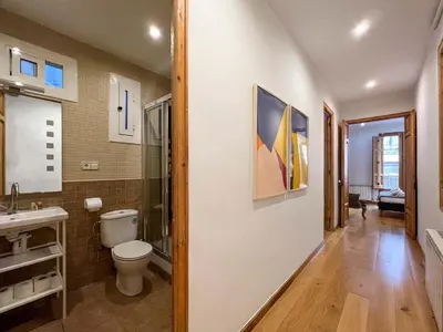 a bathroom with a toilet and a sink at Stay U-nique Apartments Mistral II in Barcelona