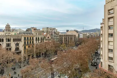 a view of a city with buildings and trees at Canela Homes BARCELONA EIXAMPLE in Barcelona
