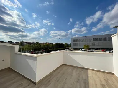 a balcony with a view of a parking lot at manresa universidad in Manresa