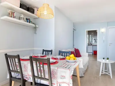 a dining room with a table with a bowl of fruit on it at Apartment Clipper by Interhome in Sant Vicenç de Montalt