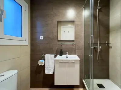 a bathroom with a sink and a shower at Stay U-nique Apartments Rambla Catalunya V in Barcelona