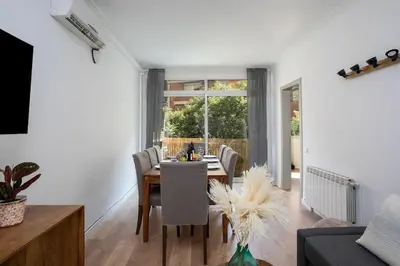 a dining room with a table and chairs at Canela Homes BARCELONA PADILLA in Barcelona