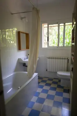 a kitchen with a table with a plate of food on it at casabelladona in Sant Cugat del Vallès