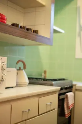 a kitchen with a counter top with a tea kettle at Stunning Designer 2 Bed Apt in Glorious Gràcia in Barcelona