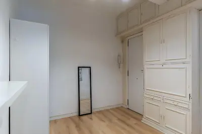 a room with white walls and a mirror on the wall at 1690 - AB Eixample Rosselló in Barcelona