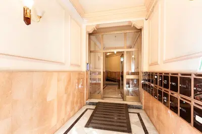a hallway with a staircase leading into a building at Enjoy Apartments Urban Retreat Valencia 2 in Barcelona
