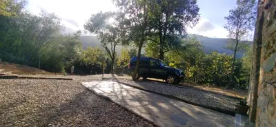 a car parked on the side of a road at Masia Casa Nova de n'Illa in Montseny