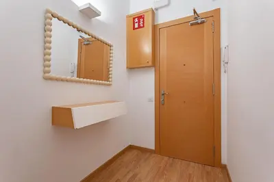 a bathroom with a sink and a mirror at Ola Living Sagrada Familia in Barcelona