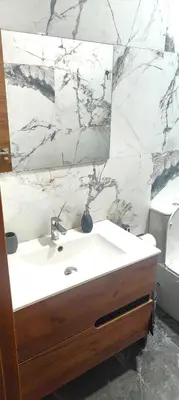a bathroom with a white sink and a mirror at Beautiful Appartment in Martorell (Barcelona) in Martorell