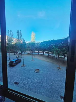 a view of a car parked in a parking lot at Sweet home in Sant Adria de Besos