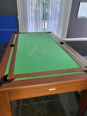 a table with a green playing field on it at VILLA 5 PLAYA A 2 MINUTOS in Castelldefels