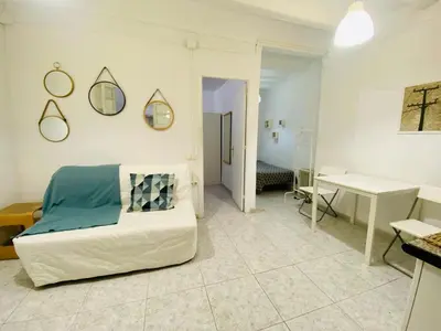 a living room with a couch and a table at 017 New of love 3 1 in Barcelona