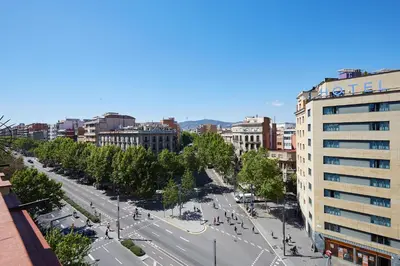 a view of a city with a street and buildings at AB Paral·lel Spacious Apartments in Barcelona