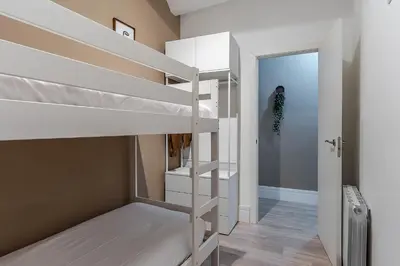 a bedroom with two bunk beds in a room at 4212 - AB Poble Sec in Barcelona
