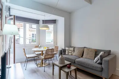 a living room with a couch and a table at 4212 - AB Poble Sec in Barcelona