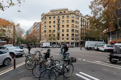a group of bikes parked on the side of a street at Centric and spacious, excellent for families in Barcelona
